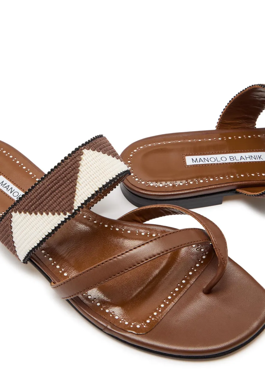 Susastra 10 cross-over wool and leather sandals