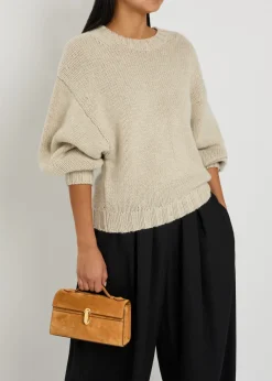 Symmetry suede pochette