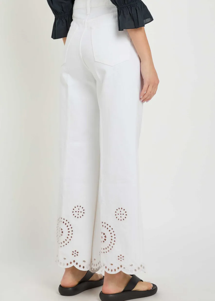 The Eyelet Flare embroidered flared-leg jeans