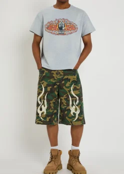 Tribal camo-printed denim shorts
