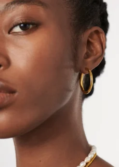 Tunnel large 18kt gold-plated hoop earrings