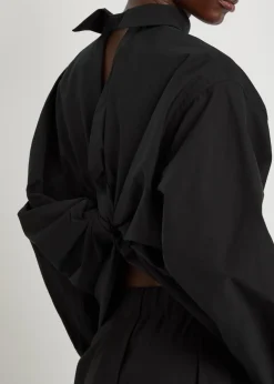 Twisted draped cotton-blend shirt