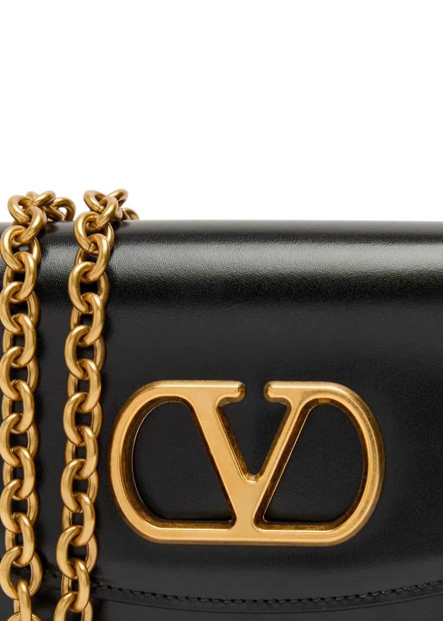Vain small leather clutch