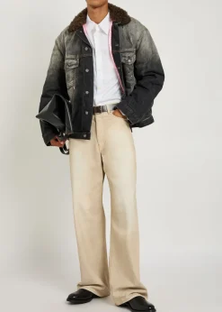 Washed paint splattered faux shearling denim jacket