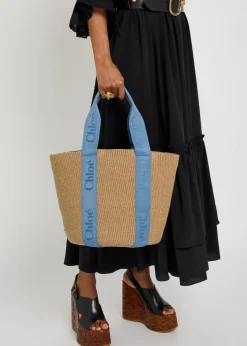 Woody logo-embroidered raffia basket bag